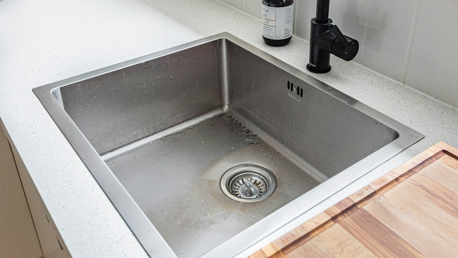 Stainless steel inset kitchen sink in a contemporary UK kitchen