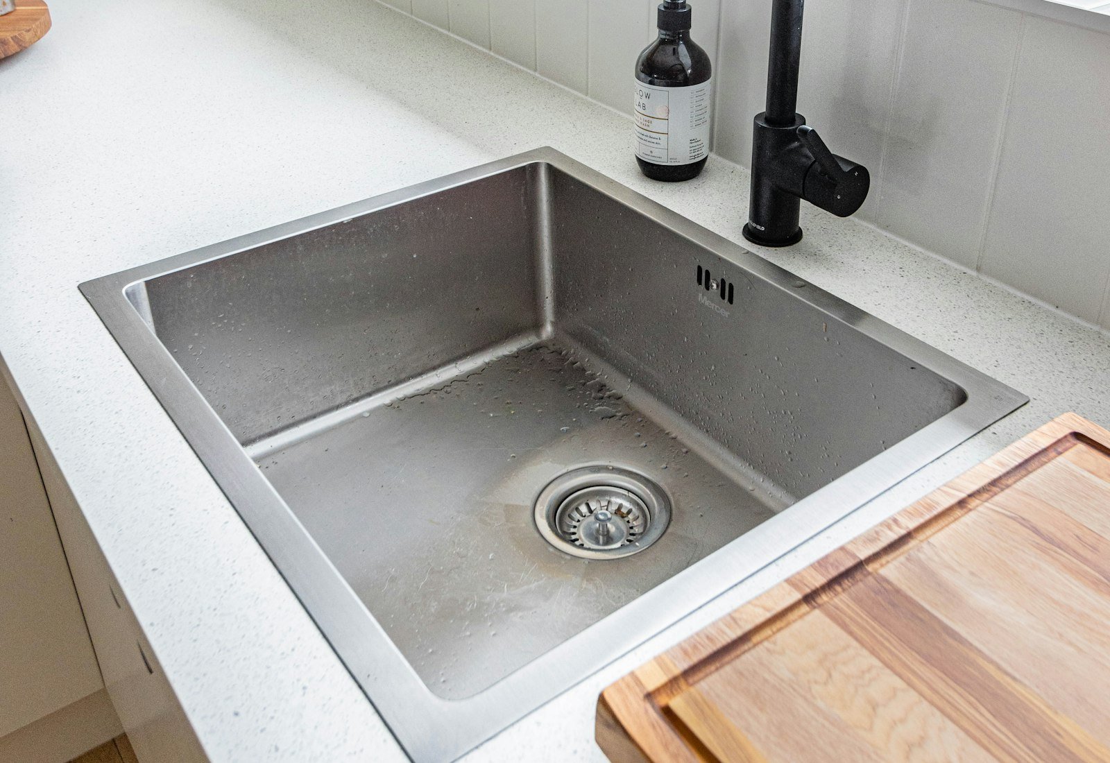 Stainless steel inset kitchen sink in a contemporary UK kitchen