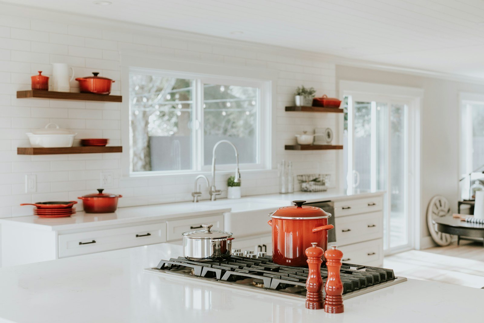 two air fryer drawers open beside prepared ingredients