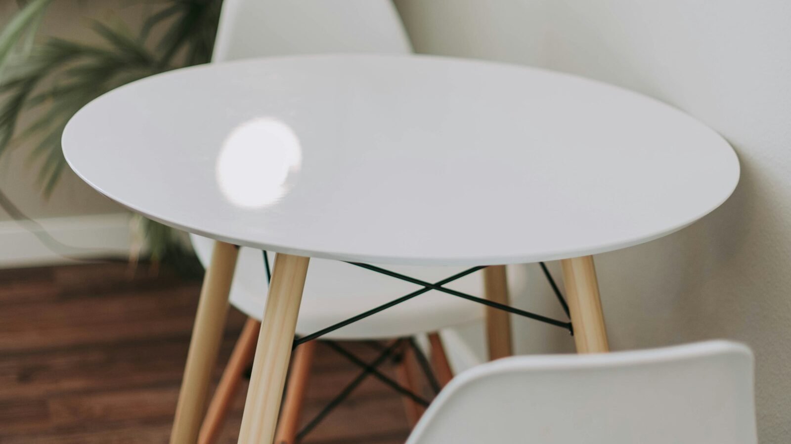 outdoor sofa set arranged around a low table on a paved garden terrace