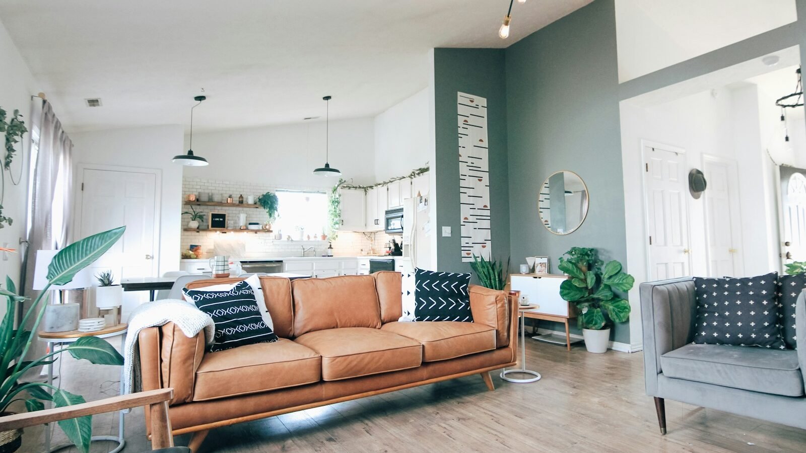 pair of upholstered living room chairs arranged beside a sofa