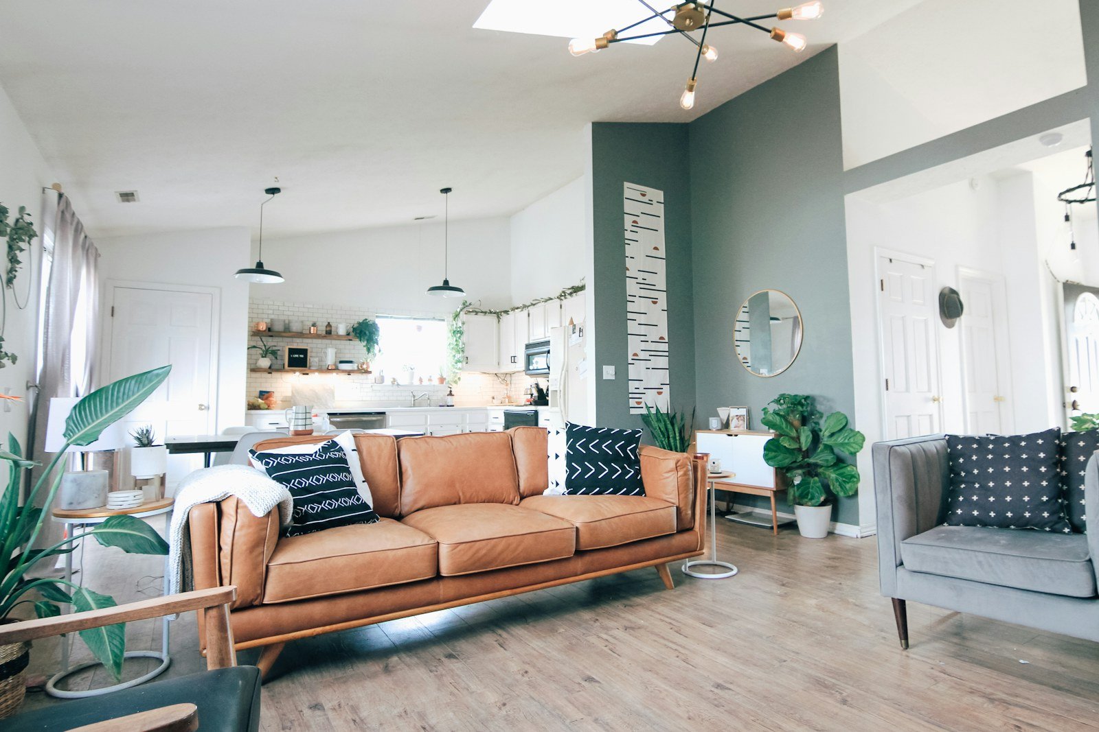 pair of upholstered living room chairs arranged beside a sofa