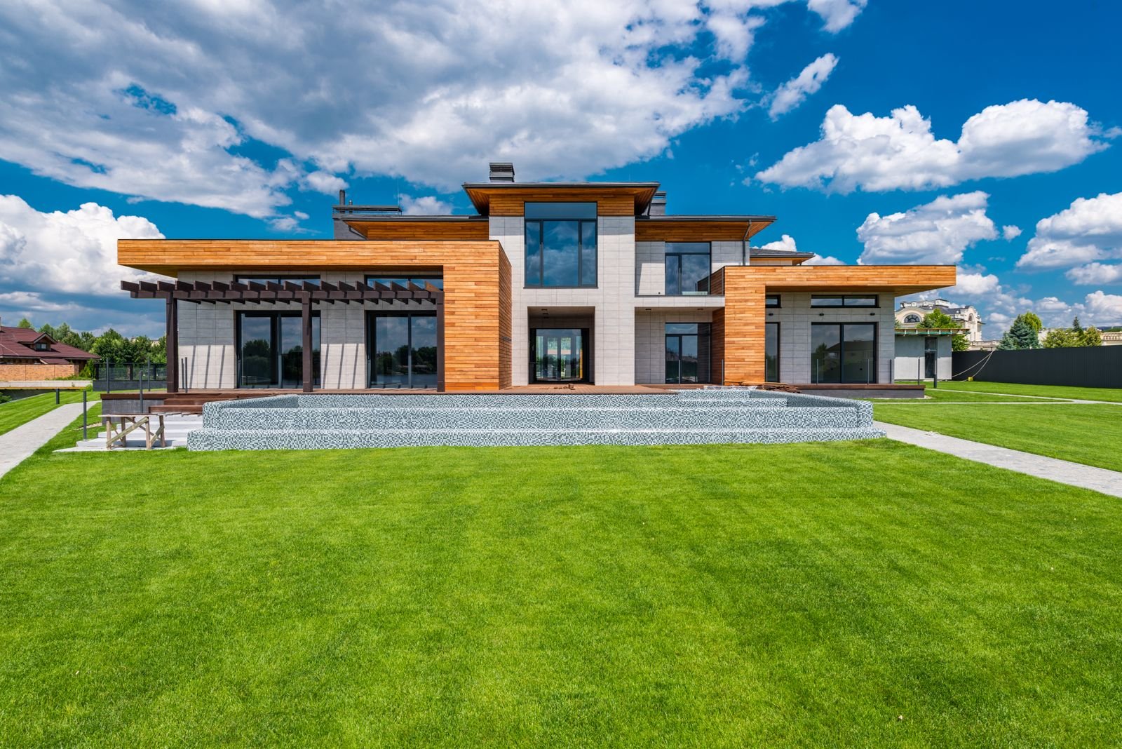 Contemporary new-build home with a simple lawn and garden