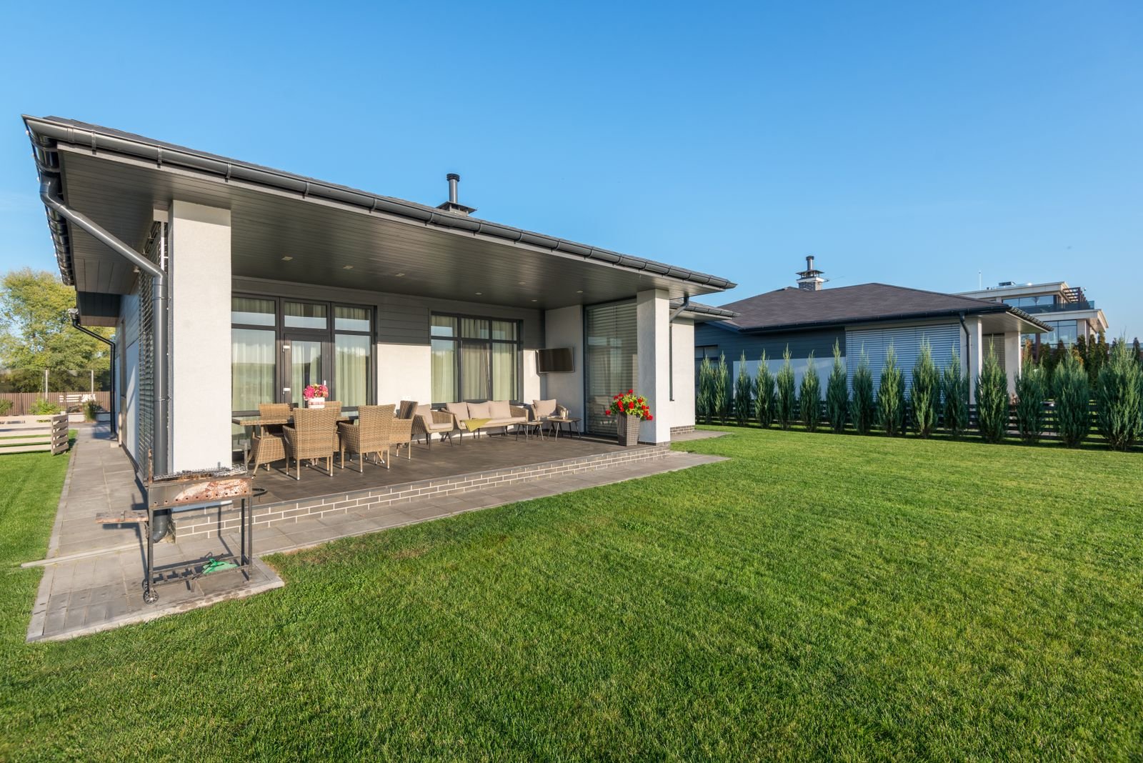 Modern house with a landscaped rear garden and patio