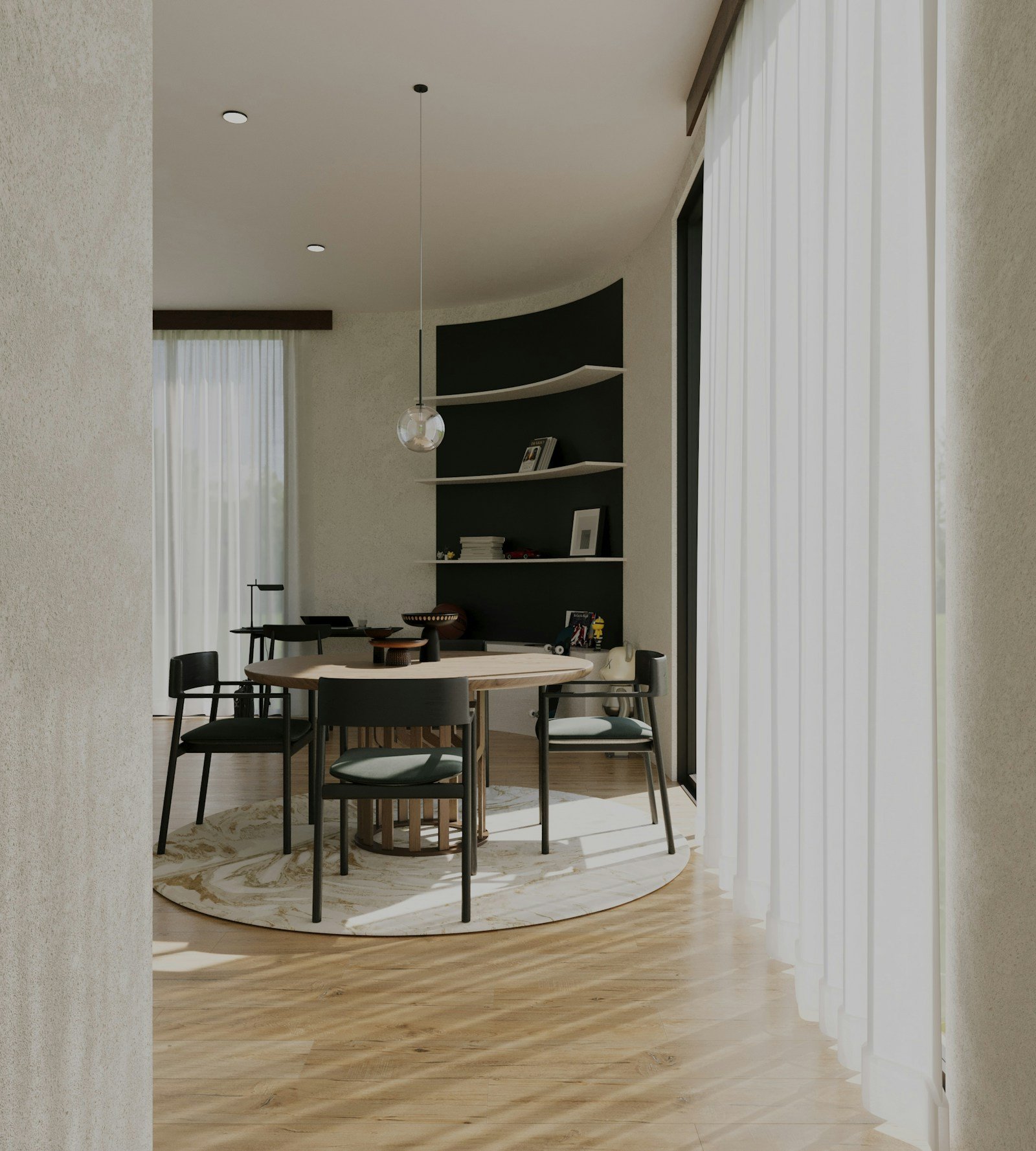 Round dining table with chairs in a home dining room
