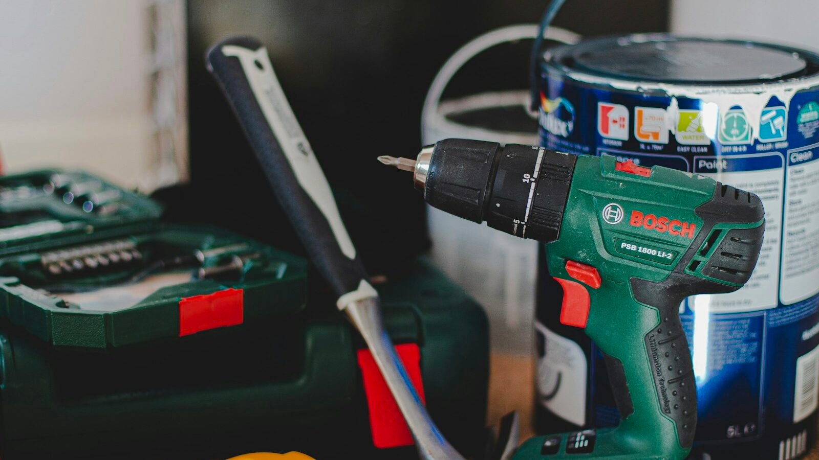 Cordless drill, hammer and stud finder ready for home maintenance