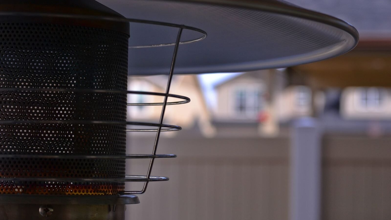 Outdoor heater warming a patio seating area in a UK garden