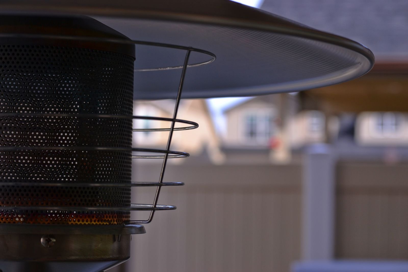 Outdoor heater warming a patio seating area in a UK garden