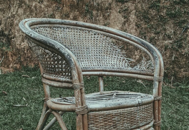 Single rattan garden chair with woven natural frame