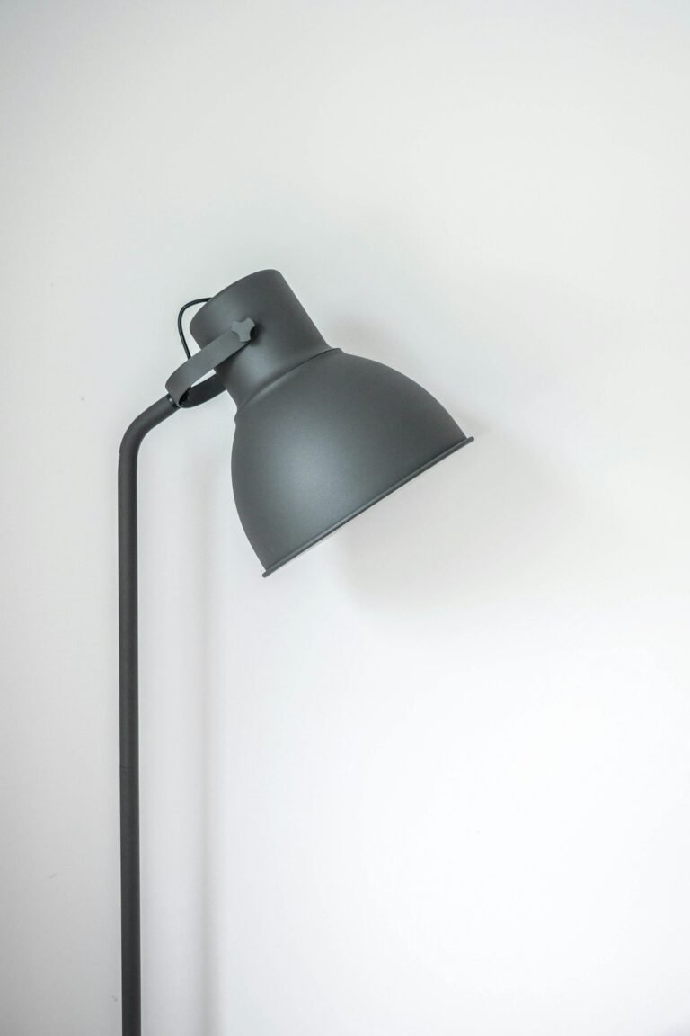 rechargeable light bulb glowing in a table lamp