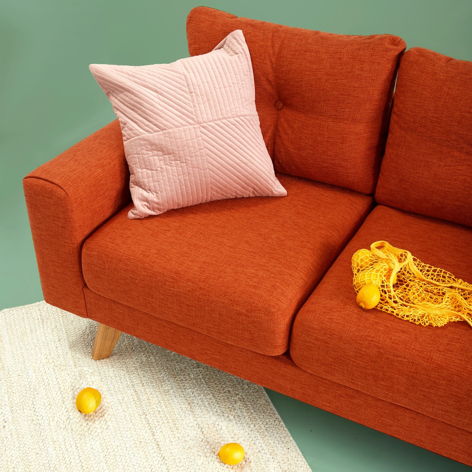 compact upholstered armchair beside a side table