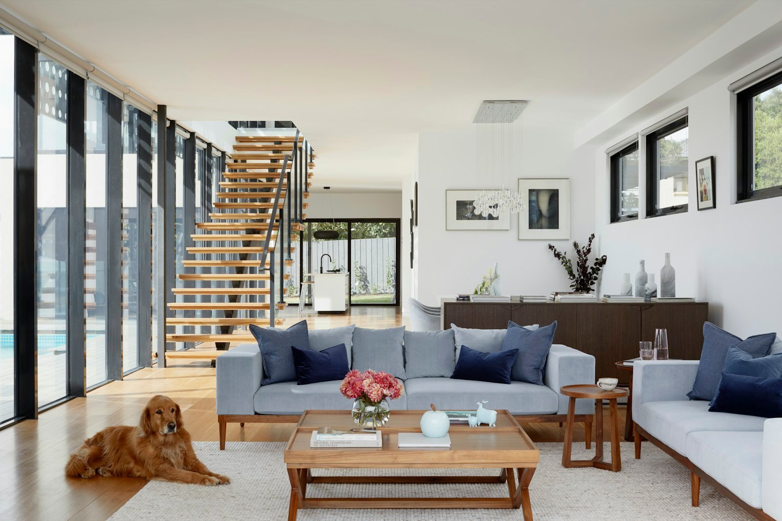 compact living room with a carefully scaled sofa and layered lighting