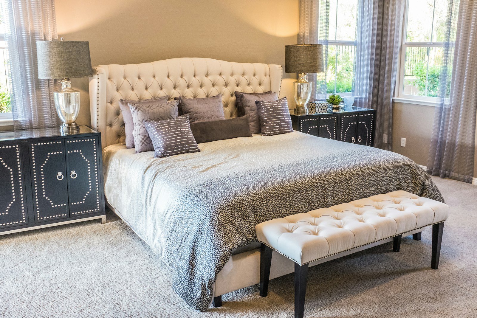 Modern teenage bedroom with a made bed and flexible neutral decor