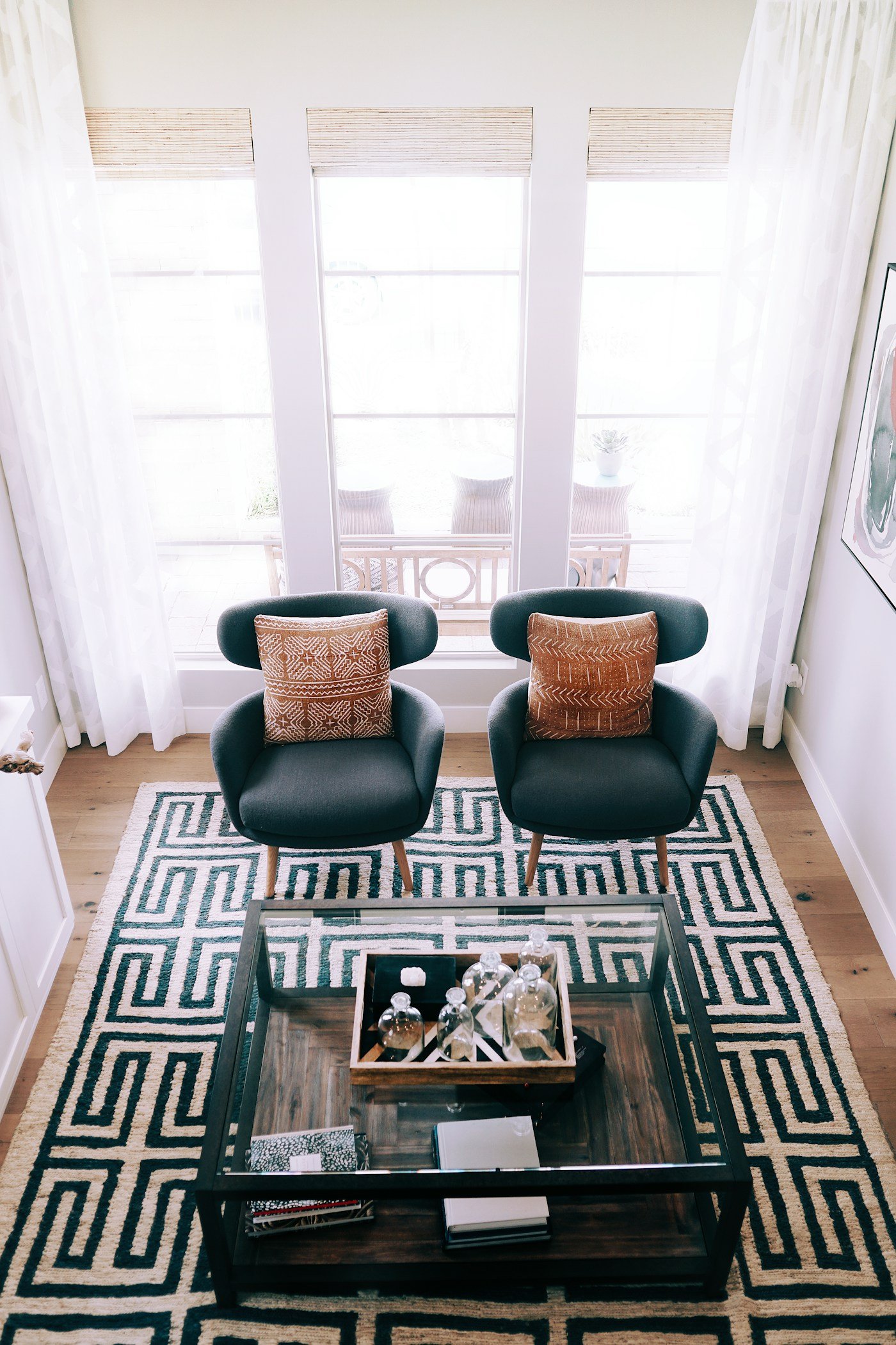 Black and white geometric rug in a furnished living room