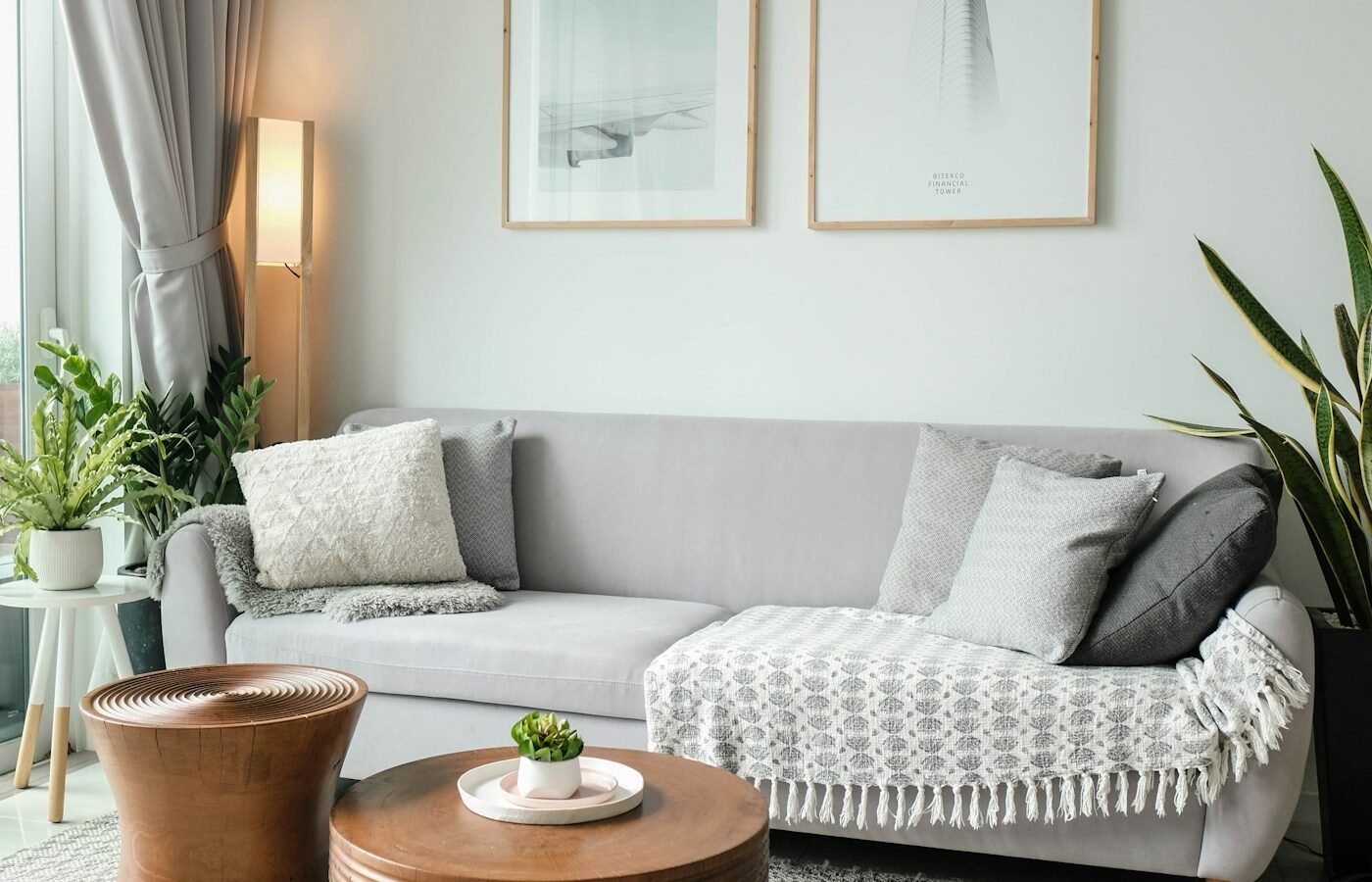 Round seating area and rug in a bright living room