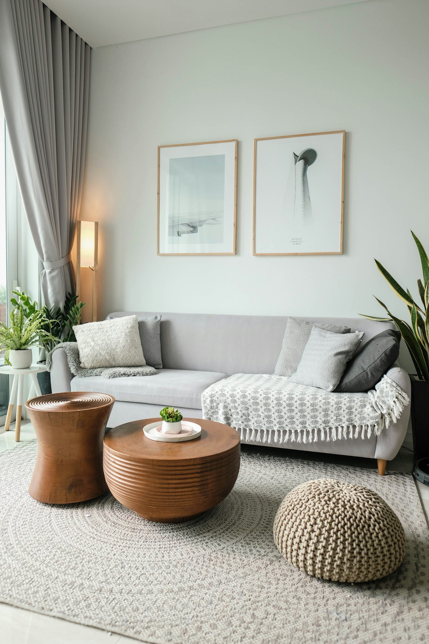 Round seating area and rug in a bright living room