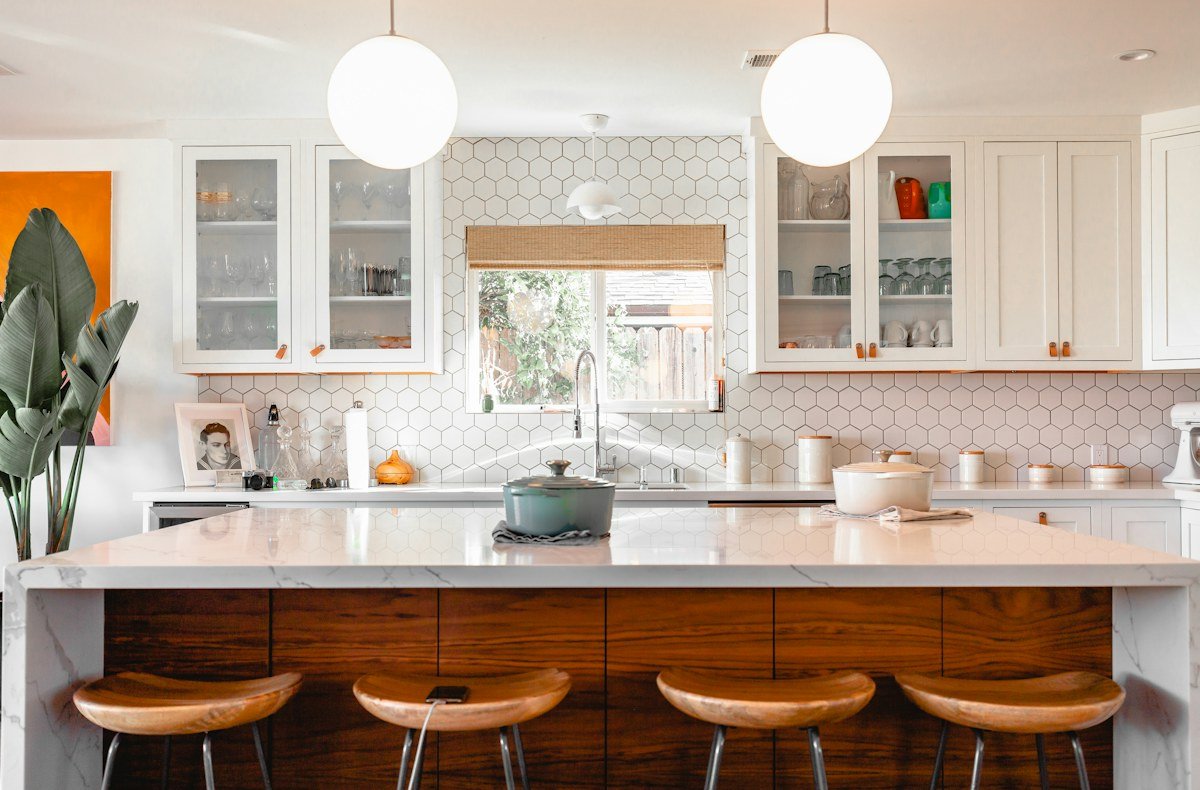 Oak kitchen cabinetry with worktop and lighting