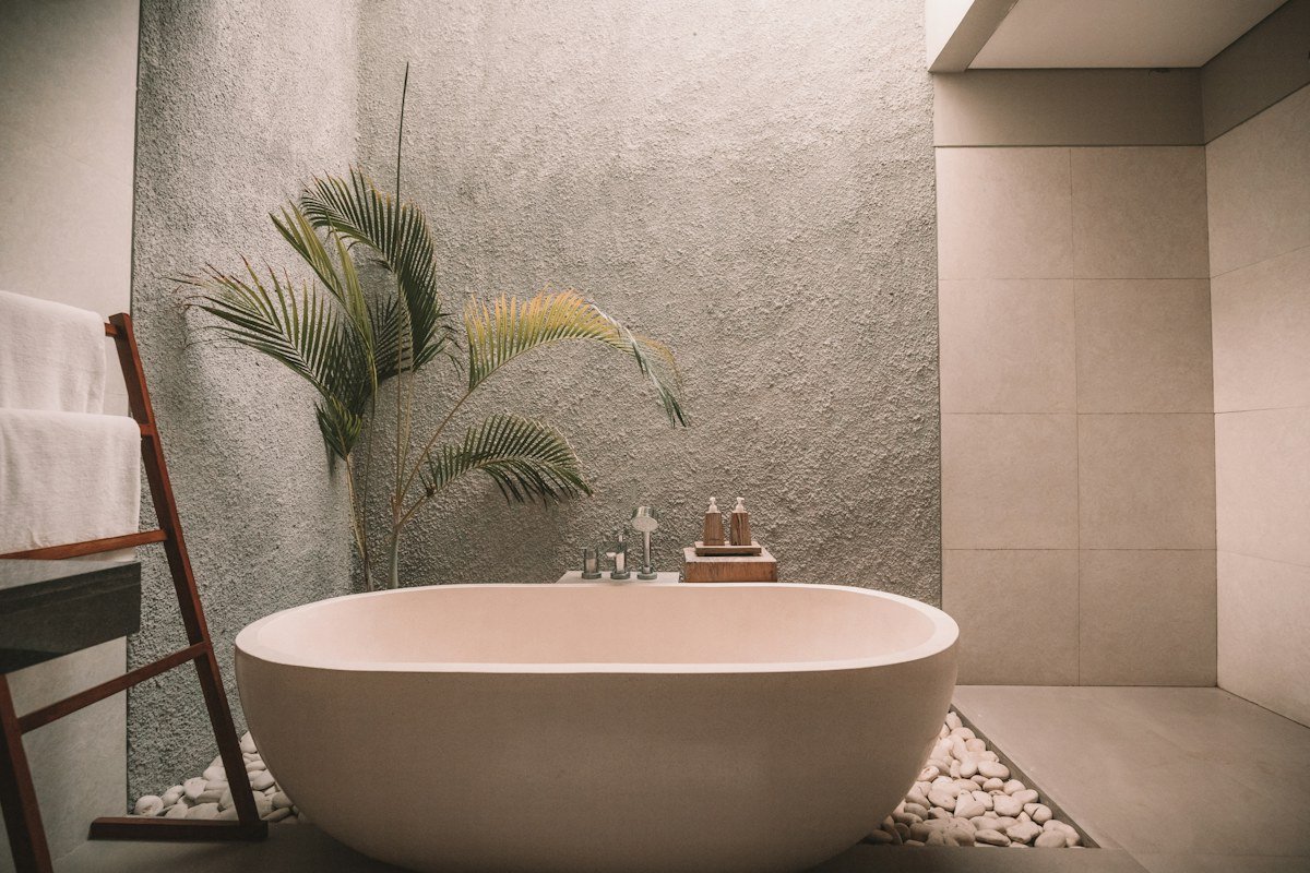 Small ensuite bathroom with shower and storage