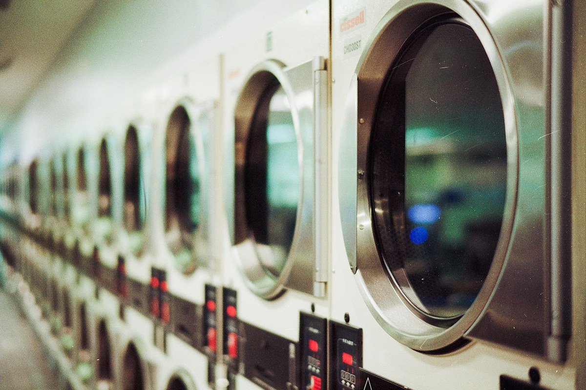 Clothes drying on a heated airer in a bright room