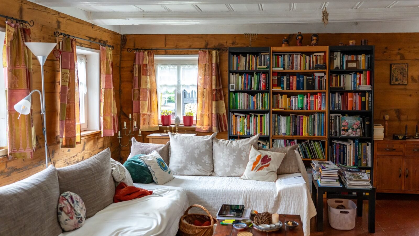 Rustic-style UK living room with natural wood, wool and linen textures